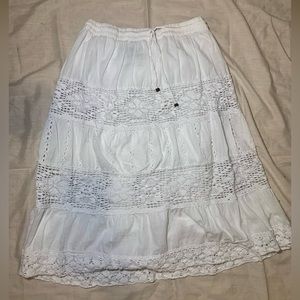 A white midi skirt with cute flower designs- size- medium